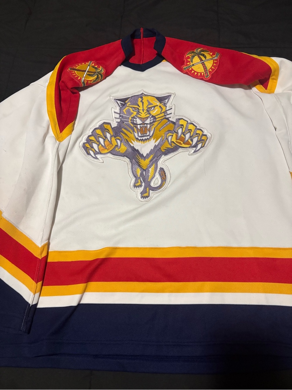 CCM White Hockey Jersey with Red, Yellow & Navy Accents